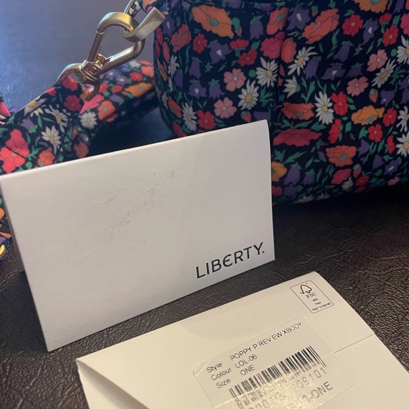 Reversible Floral/Black Crossbody Bag - Picture 9 of 9